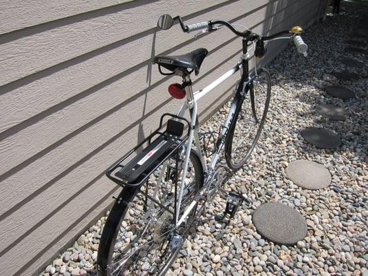 Road bike transferred to urban cruiser.  Check out the Brooks saddle, side mirror and bell!