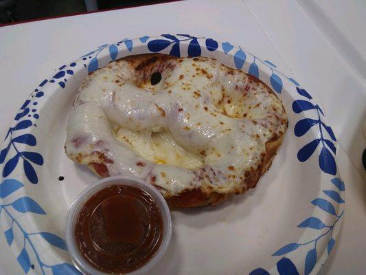 Pretzel Pizza with sauce on the side.