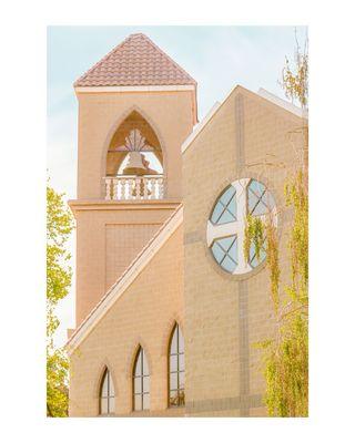 Church bell and cross side view