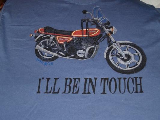 Motorcycle on Tee Shirt with the owner's favorite saying.