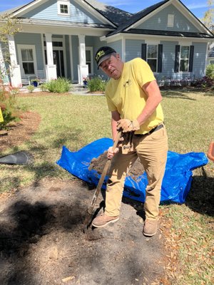 Scott Prepping an area for  a Weeping Bottlebrush tree to be install.