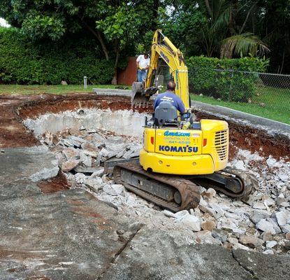 Breaking up the concrete.