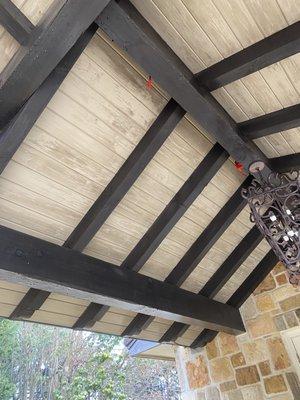 Before cleaning wood patio ceiling.