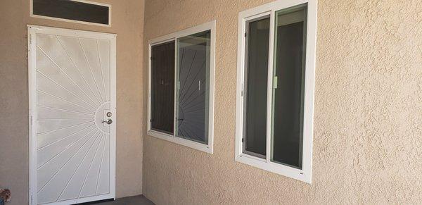 Front windows.  Kitchen and laundry room.