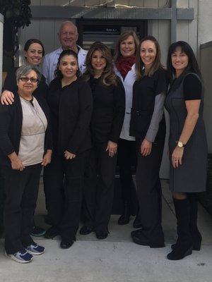 Dr. Staahl, Dr. Cockerham, and staff pose at the Ribbon Cutting Celebration of our new Hair Restoration Center.