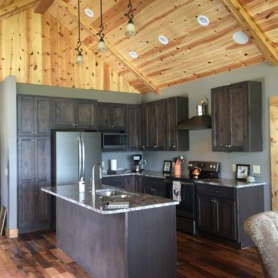 Fully equipped kitchen adjacent to great room.