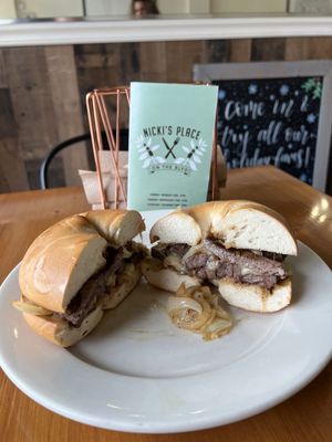 This was delicious skirt steak onions and pepper jack cheese on a bagel. Winner Winner