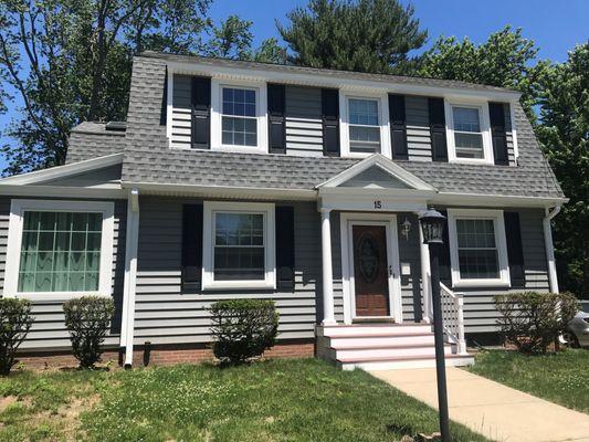 Sterling Gray, with Glacier White trim, solid black shutters