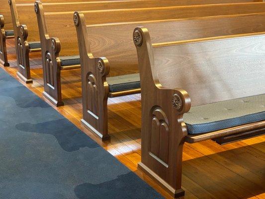 Church renovation with floor restoration, a new stage design, pew replication & pew cushions