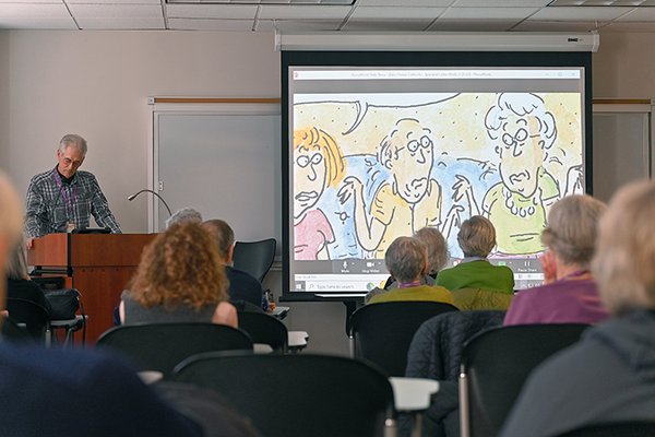 In the New Yorker cartoon class, the presenter, shows a video about  Roz Chast. Photo: Glassman/Tribeca Trib