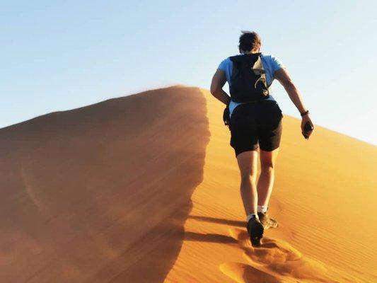 Climbing Big Daddy the tallest dune in the Sossusvlei Namibia