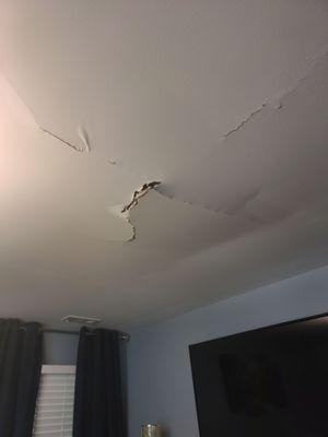 Damaged to my ceiling due to the drip-pan overflowing and leaking through my ceiling.