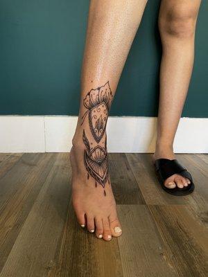 Ornamental ankle tattoo