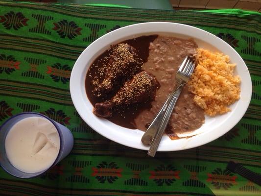 Chicken Mole w/ rice & beans. Horchata on the side.