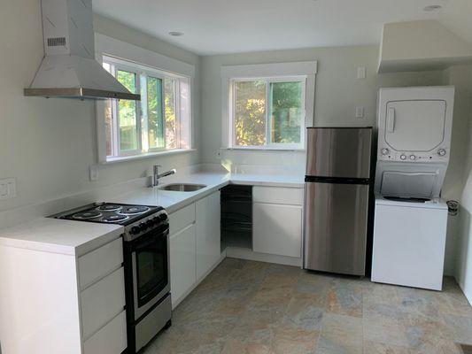 Kitchen and laundry near the completion of the project