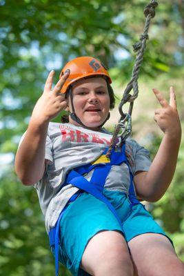 Harness up, we are climbing the trees in Adventure Camp.