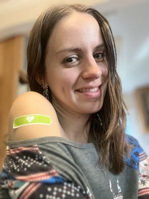 My 2023 updated Flu vaccine. I love how they have adorable heart bandaids, I got neon green!