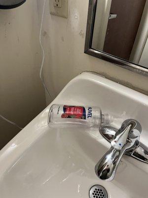 Disgusting bathroom with no soap, the same empty soap container has been there the last 3 times I have been there