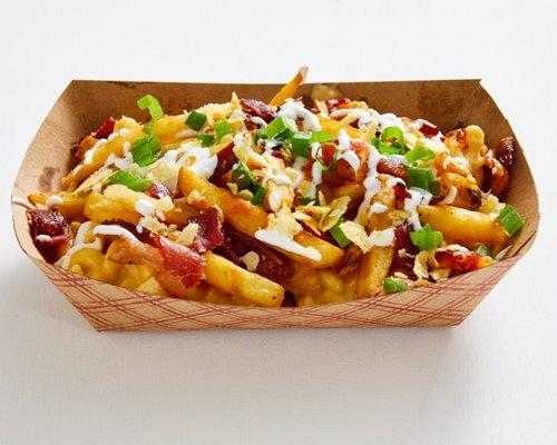 Loaded Potato Mac! OG Mac topped with hand-cut fries, bacon, sour cream, scallions, & finished with potato chip crunch