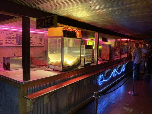 The concession stand is a time warp of pure nostalgia. You will get the best Double Cheeseburger in the world here. Not joking.