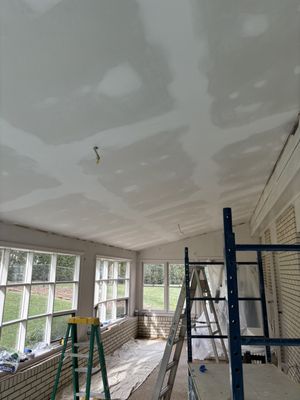 This is the 3-season room after I put up a new ceiling put in a new door and prepped for painting.