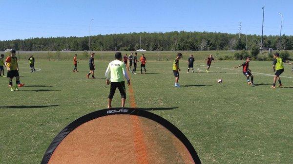 Former professional player training the U16 team