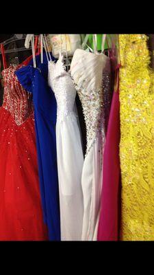 Every color of gown possible, lined up to have their unique alteration completed.