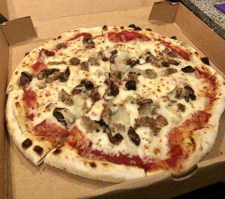 My go-to custom pizza: ex cheese, sausage, mushrooms, and sautéed onions.