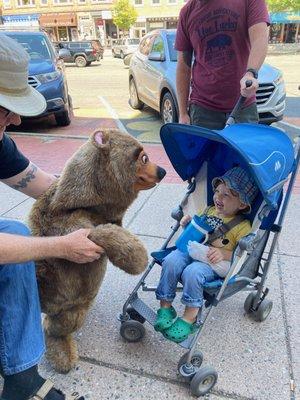 Theo meeting a little friend on Main St.