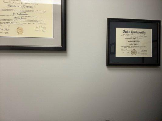 Wall covered in credentials