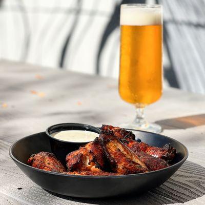 Srichacha wings and a big screen...sign me up.