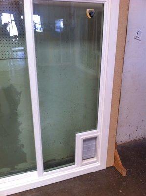 Our Custom Made Sliding Patio Door with a Pet Door Insert.