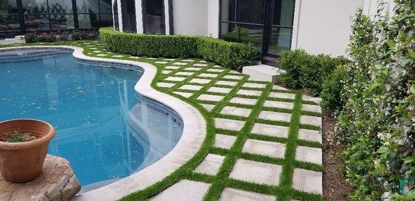 This project we had to put turf around the pool and in between the tiles