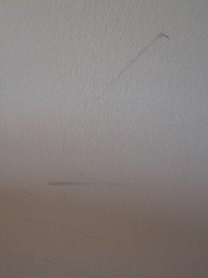 More marks on wall