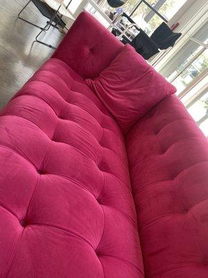 Pink velvet couch at Pink Soda