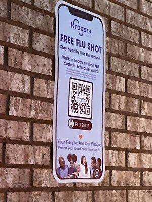 flu immunization sign on wall of drive-through (for the life of me, I don't understand the illogical thinking of anti-vaxxers)