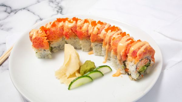 Volcano Roll: marinated crabmeat,cucumber and avocado inside, top with spicy tuna and spicy mayo