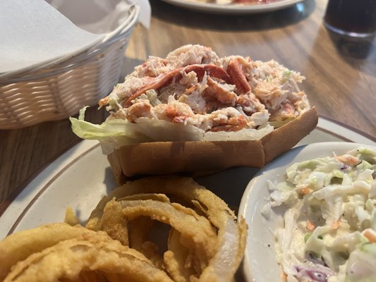 Lobster Roll with onion rings and cole slaw