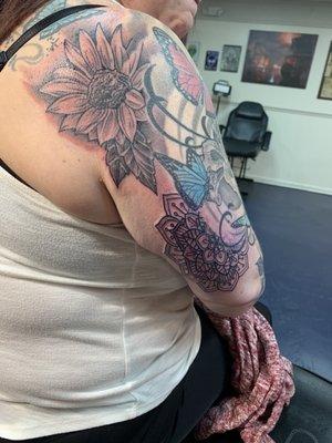 Finishing her sleeve