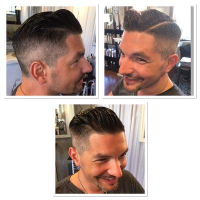 High and tight fade with hard part.