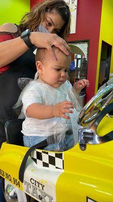 My second child getting a haircut by Teresa