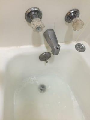 Slow draining tub