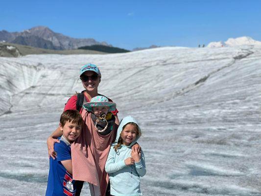 Dr Sam at Root Glacier with her three kids in Kennicott, Alaska.