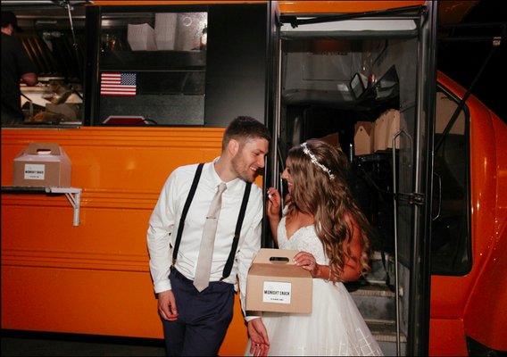 Our wedding guest favor - a surprise "Midnight Snack" of burgers, breakfast sandwiches and fries --- YUM.