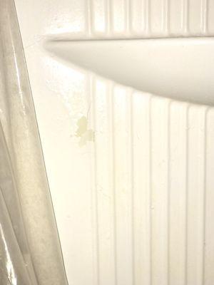 Peeling paint in tub shower area