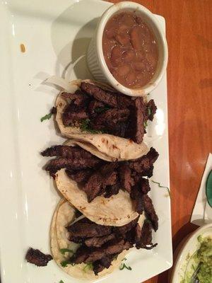 Steak tacos.  Wasn't a fan of the long uncut onions though. Steak was great!