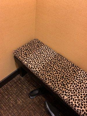 Chic bench in dressing room.