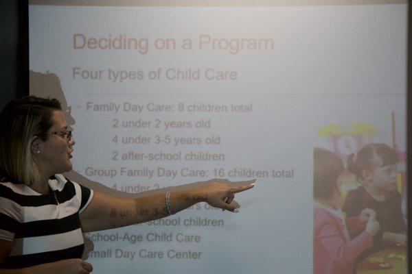 NYSELTC Trainer providing attendees with information on the four types of child care programs that one can decide to open.