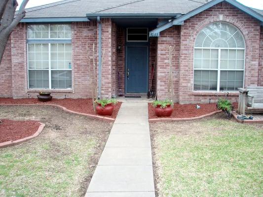 Removed all old shrubbery and redesigned the foundation plantings at this customer's residence.