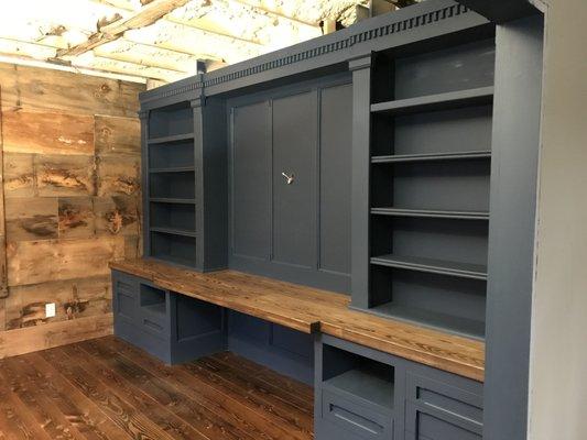 A custom desk / work station. This also has a hidden door in it to the basement.